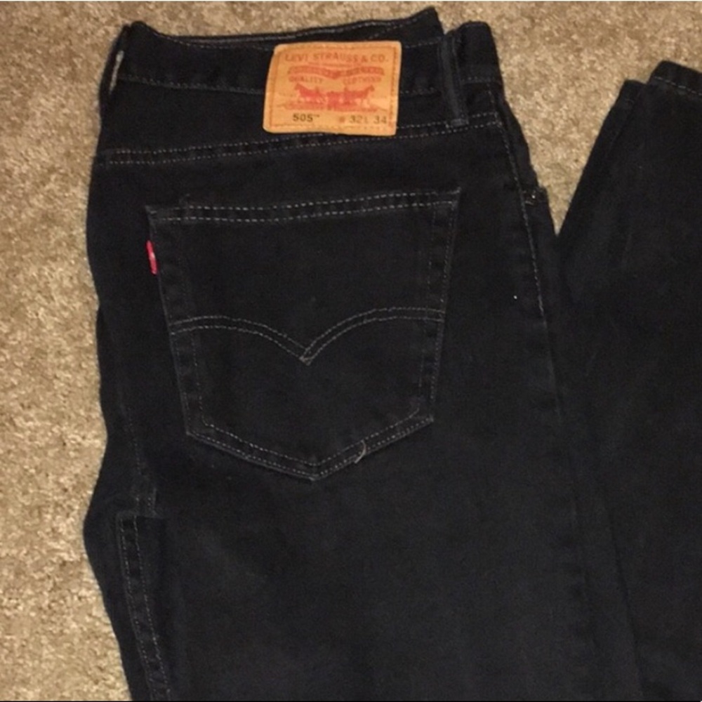 Men’s black Levi’s worn once